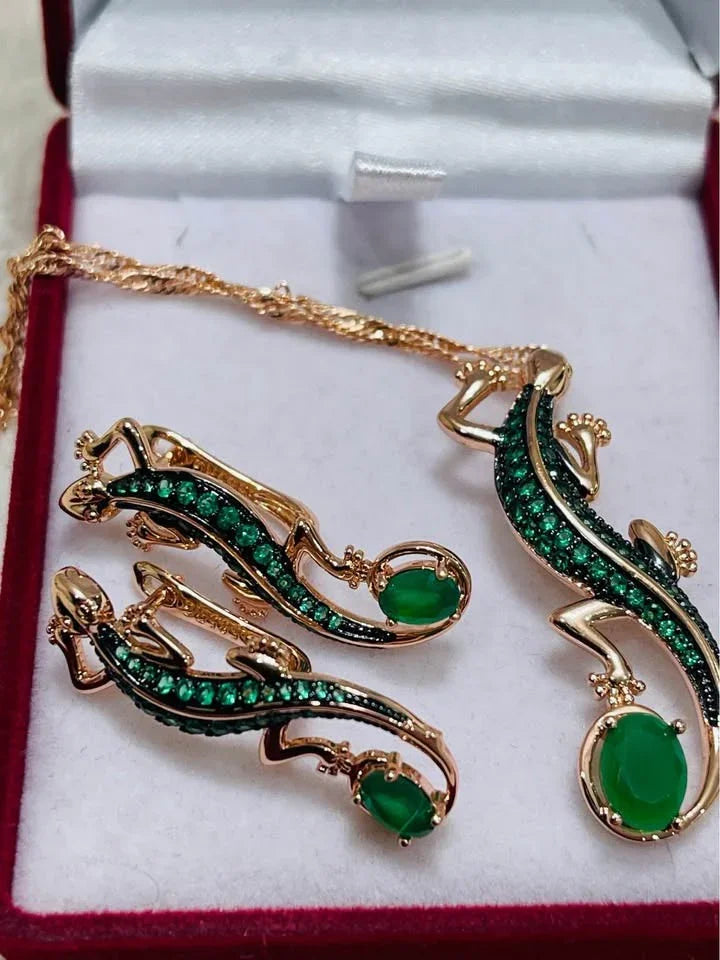 Luxurious rolled gold 585RG salamander jewelry set with intricate green detailing, in a red display box.