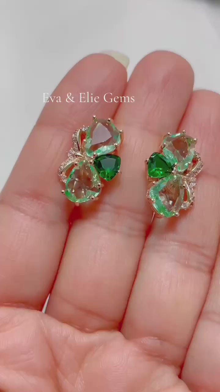 Stunning butterfly earrings with blue and pink stones in a 14k rolled gold finish.