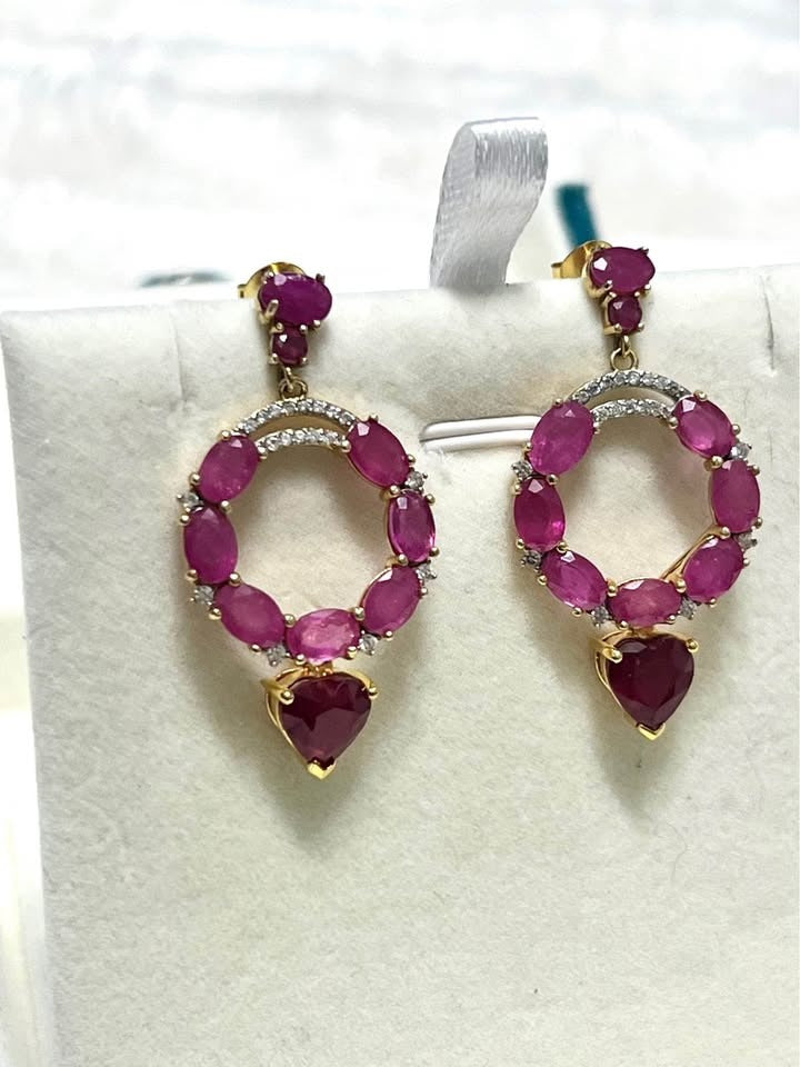 Unique Italian 10 carat genuine ruby earrings with dazzling ruby-studded hoops and dangling heart-shaped rubies.