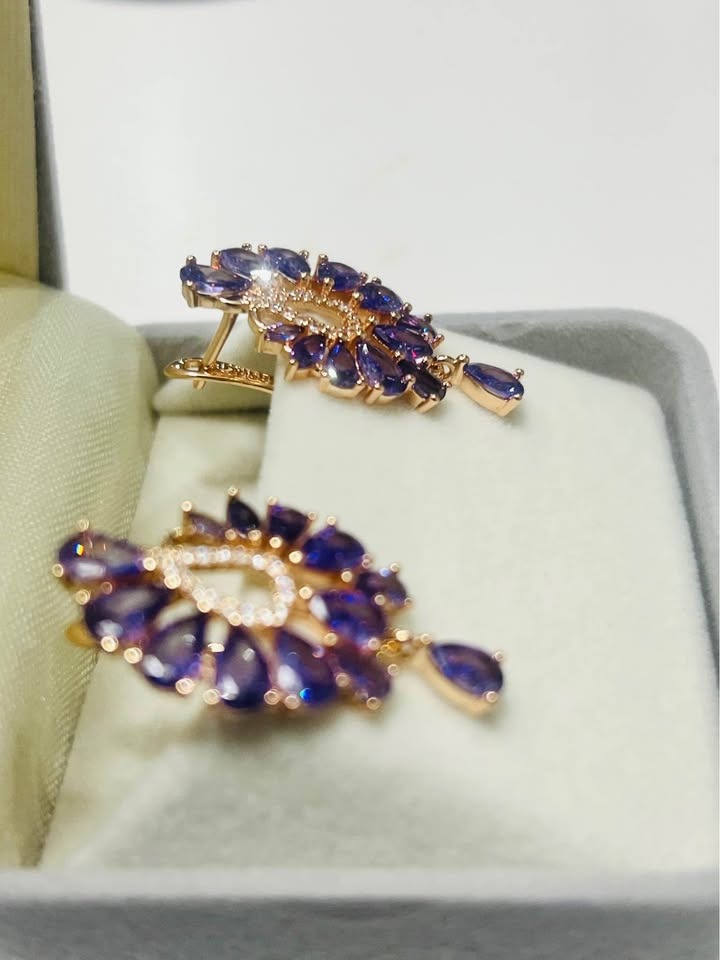 Side view of 14K gold-filled amethyst earrings in a gift box, highlighting the fine craftsmanship.