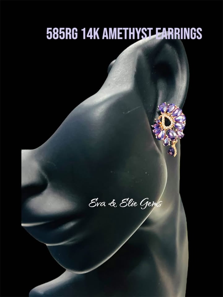 Model wearing luxurious 14K gold-filled earrings with intricate amethyst and sparkling stone details.
