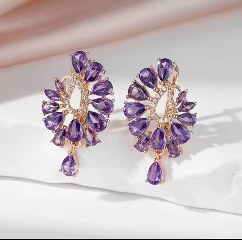 Elegant 14K gold-filled fancy earrings with dazzling teardrop-shaped amethyst and brilliant accents.