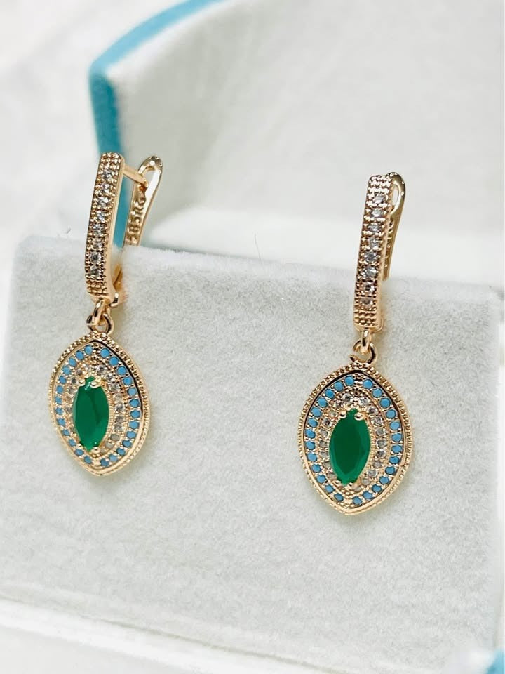  A pair of 14K RG585 stamped dangle earrings, each with a central emerald gemstone surrounded by turquoise.