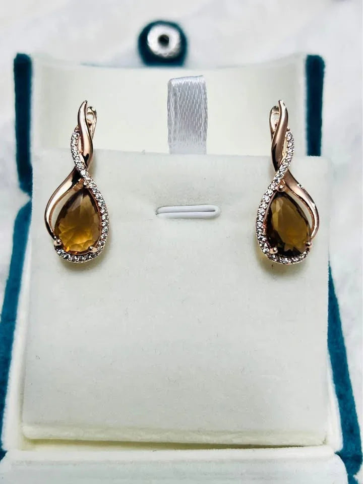 Elegant 14K gold-filled citrine teardrop earrings with sparkling accents, displayed in a white jewelry box.
