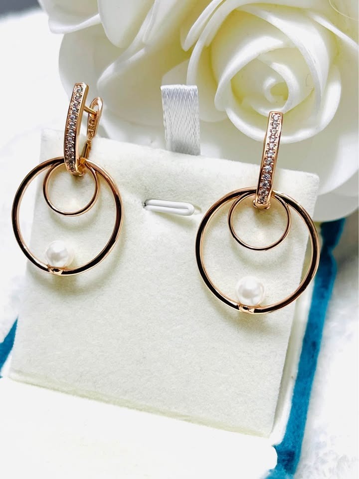 Pair of exquisite 14k gold filled double hoop earrings with pearls, displayed in a white box.