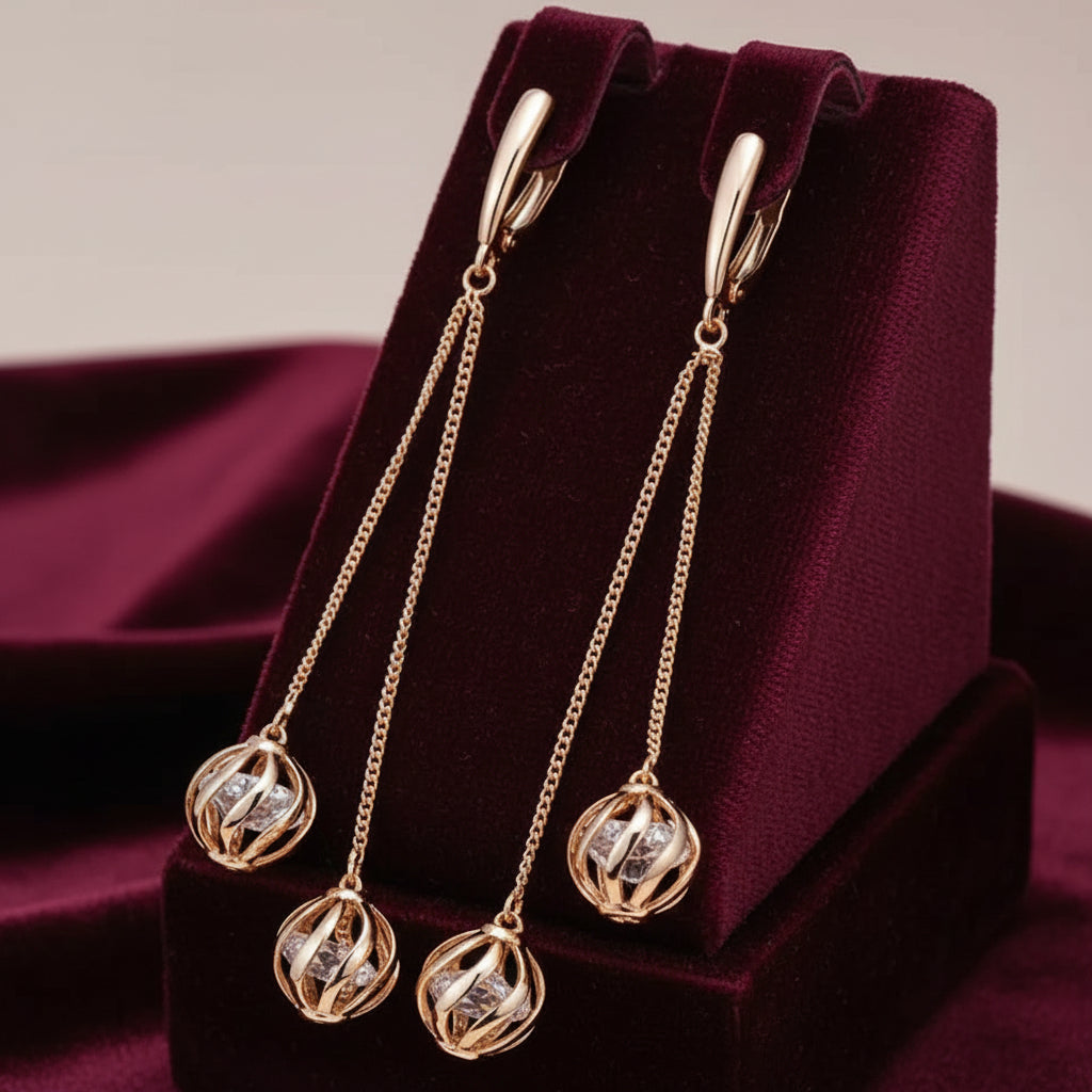 Pair of exquisite 14k rolled gold 585RG stamped long dangle earrings featuring natural zircons.