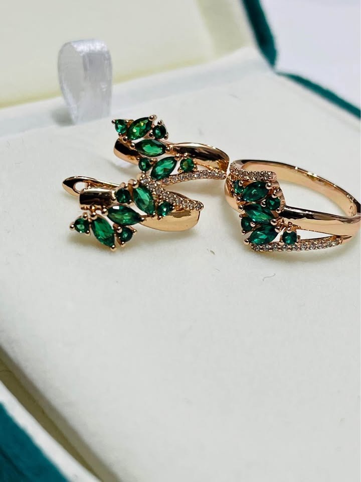  14k rolled gold jewelry set with emerald green stones and sparkling crystal accents.