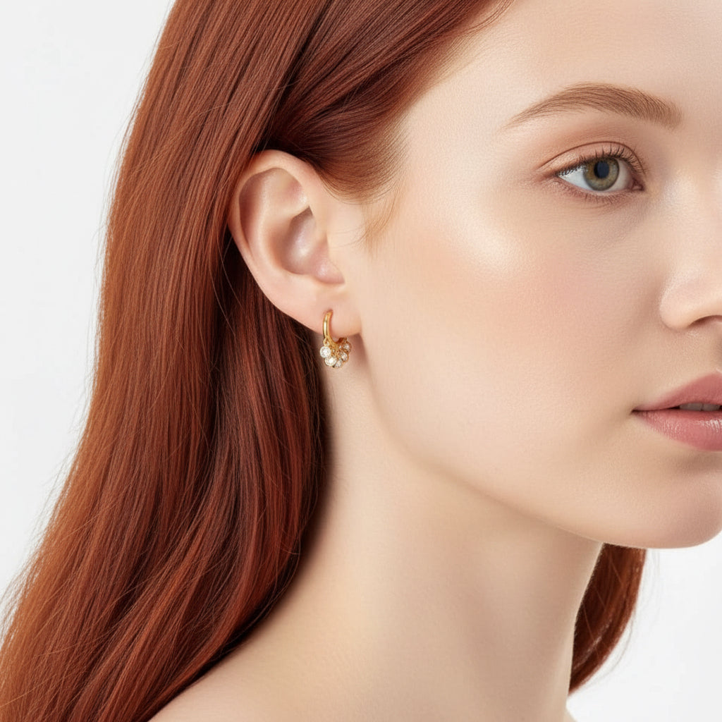 18k gold vermeil fan hippie earring worn by a model, highlighting its elegant design and fit.