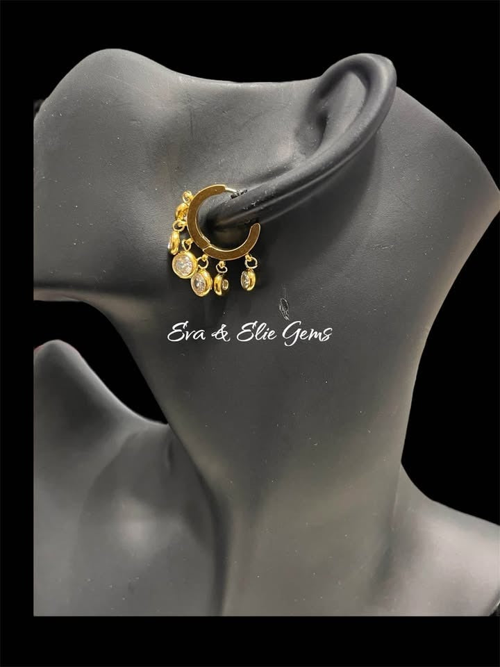 18k gold vermeil hoop earring with sparkling dangles displayed on a black mannequin, by Eva & Elie Gems.