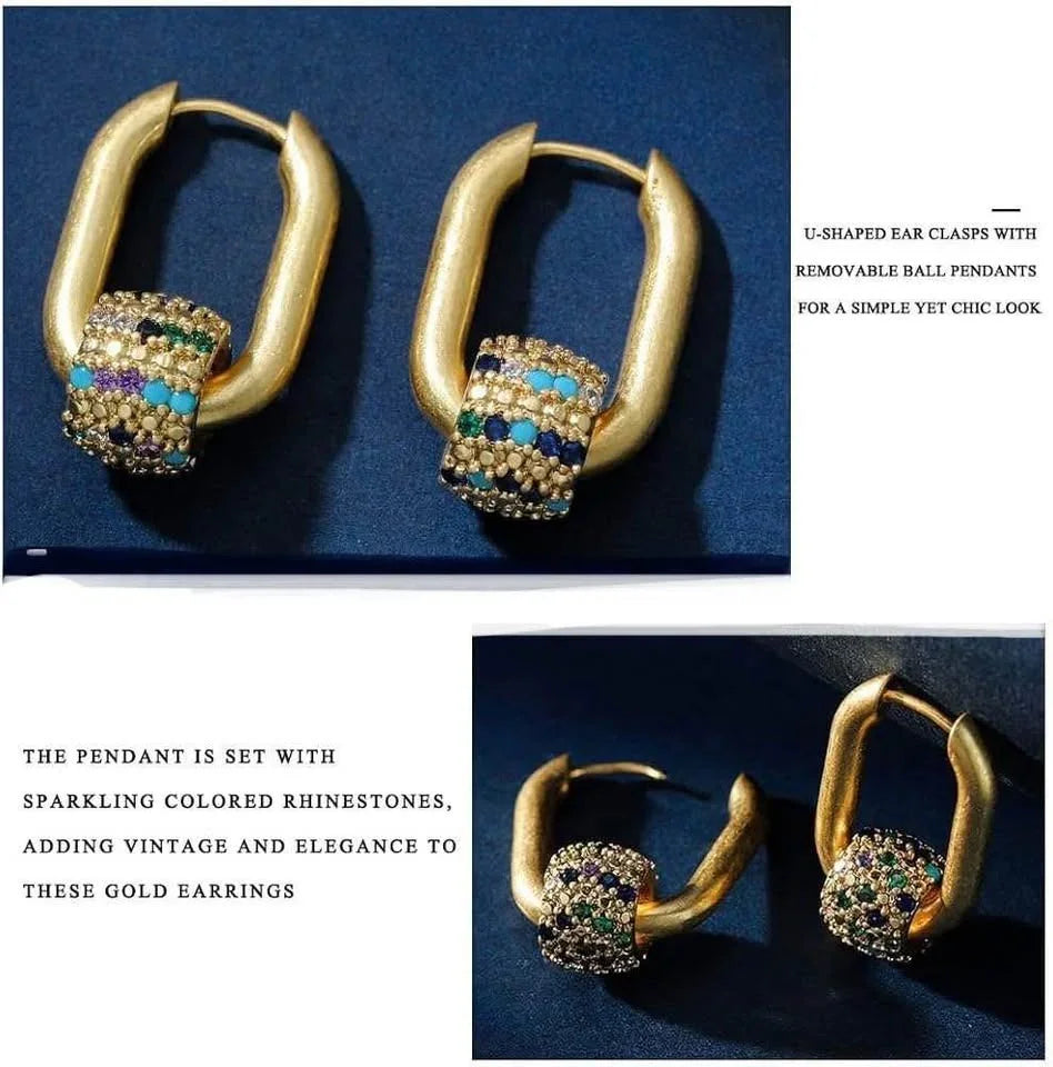 Detailed shots of gold vermeil earrings with removable rolling ball pendants and sparkling colored rhinestones.