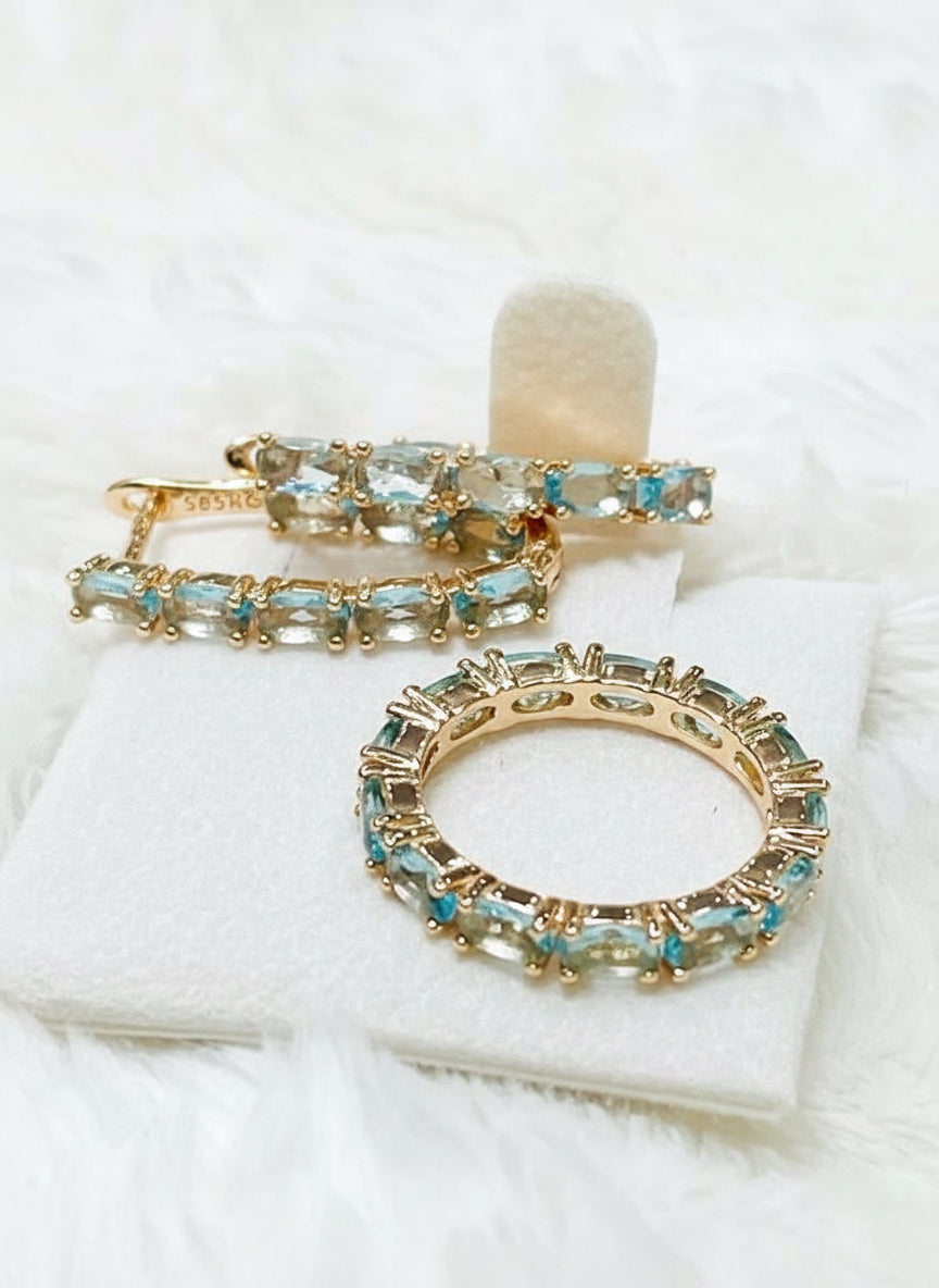 Complete set of 14k 585RG rose gold aquamarine inside-out hoops and matching eternity ring.