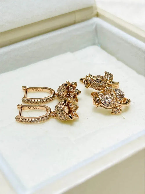 585RG stamped gold vermeil dangle earrings featuring sparkling cubic zirconia flower charms.