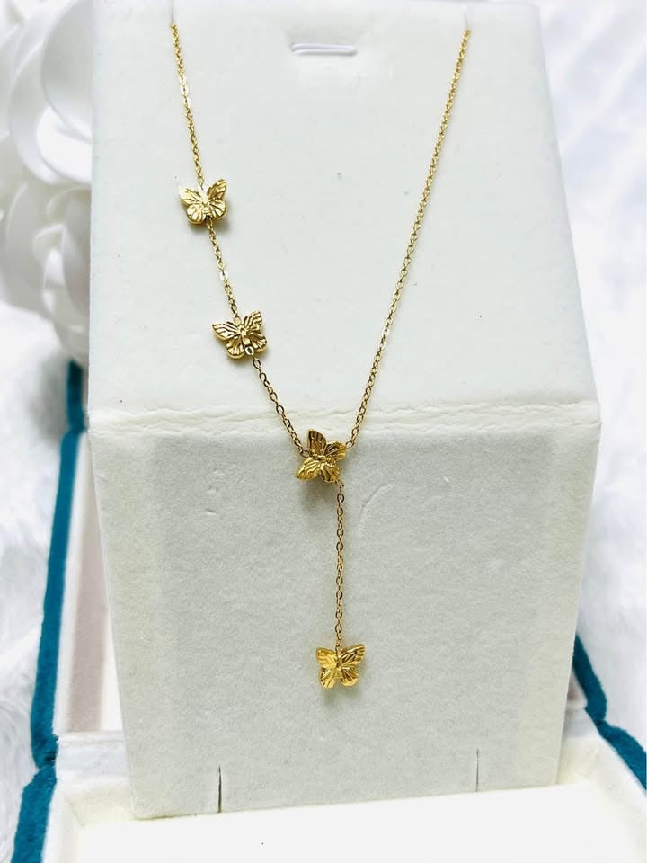 18k gold vermeil Papillon D'Or butterfly necklace showcased in a white jewelry box.