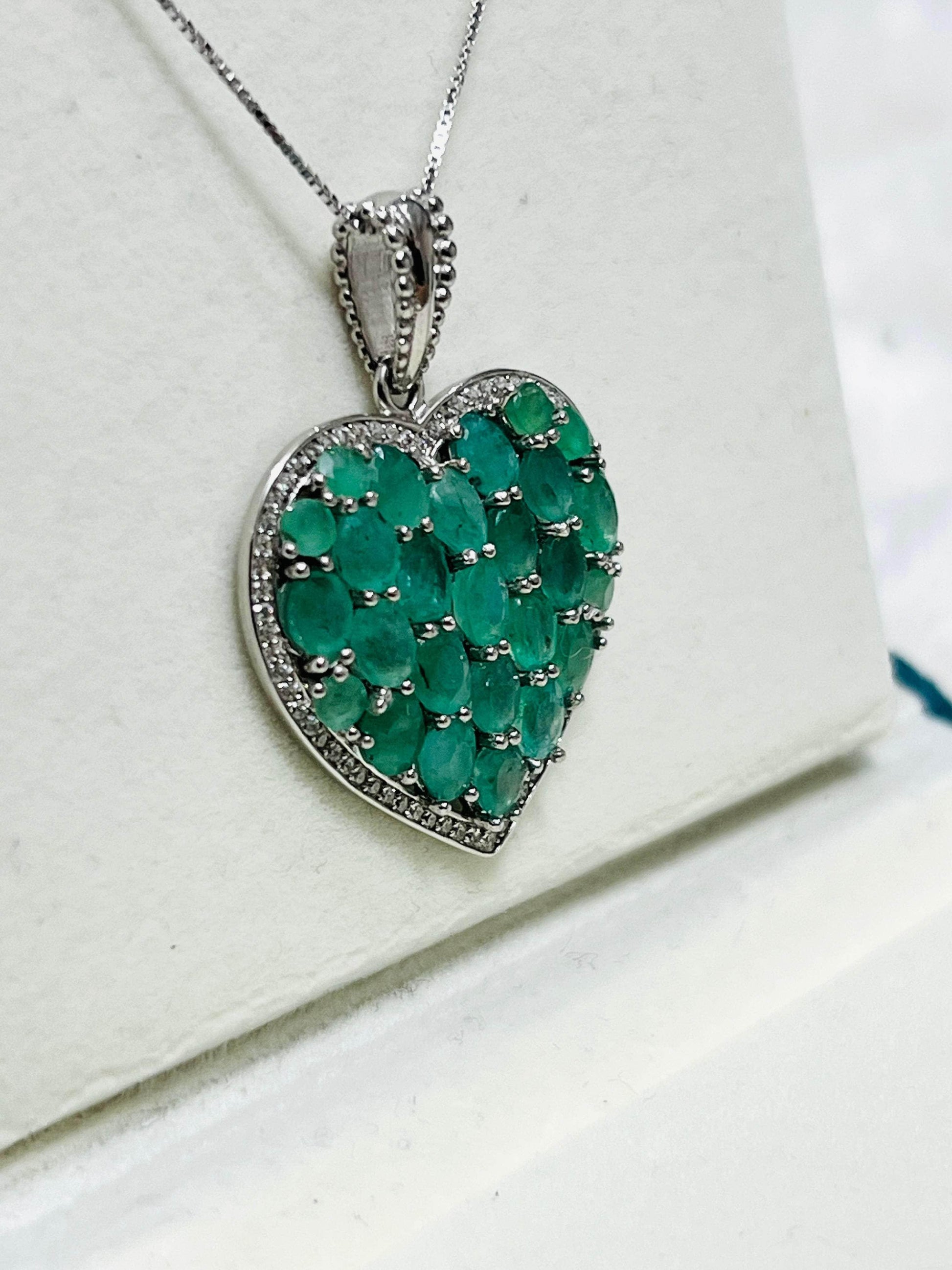 Canadian handmade sterling silver heart pendant with unheated Colombian emeralds & diamond pave.