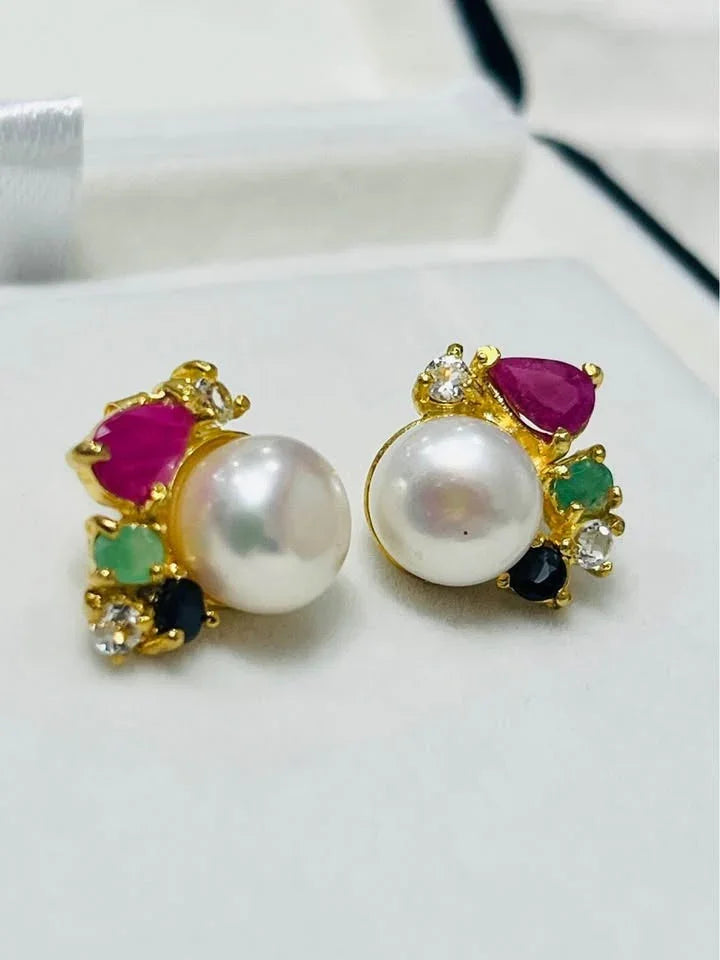 Pair of colorful South Sea pearl earrings with natural Colombian emerald, ruby, sapphire, and topaz accents.