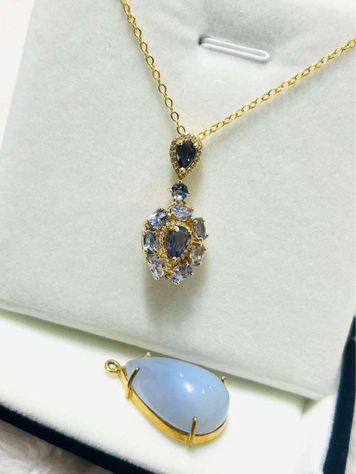  28 ct natural tanzanite and blue sapphire 2-in-1 pendant showing detachable components.