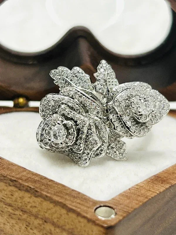 Elegant rose-shaped gold vermeil CZ statement ring, beautifully presented in a heart-shaped wooden box.