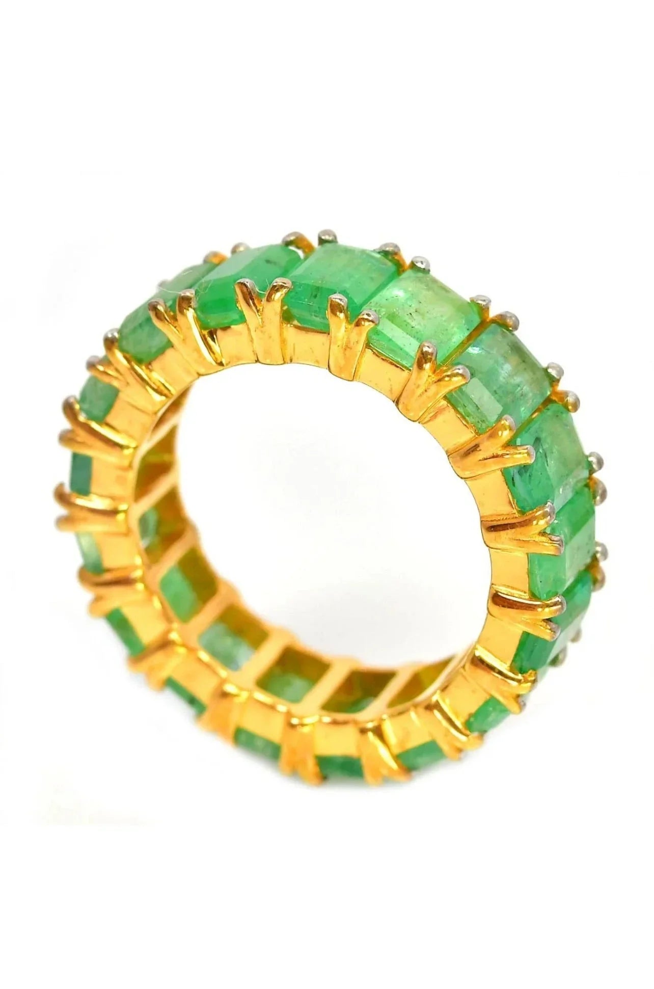 Side perspective of a luxurious emerald eternity band, showcasing 18K gold vermeil craftsmanship.