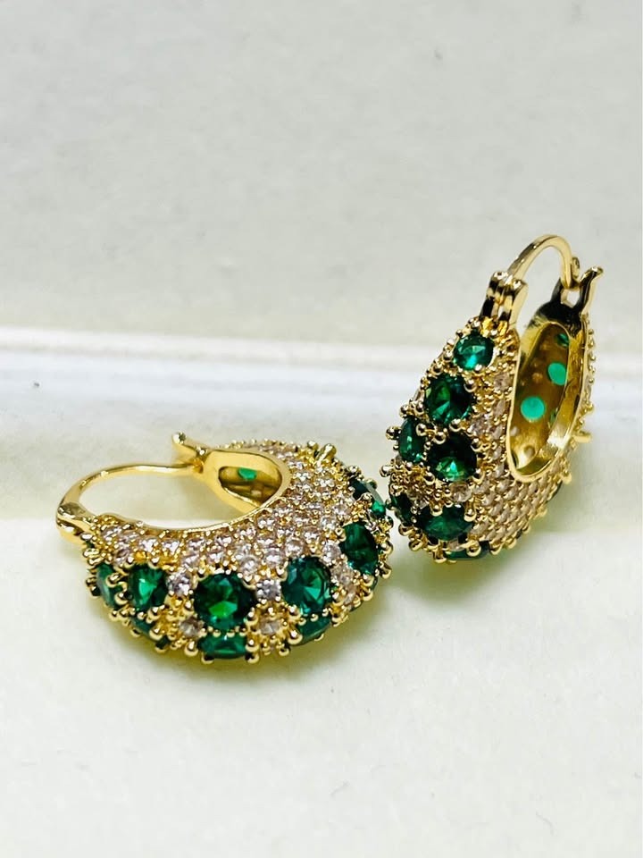 Elegant emerald green zircon and gold-filled hoop earrings with intricate pave setting.