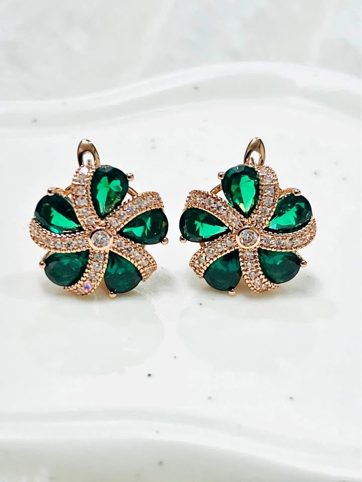 Exquisite 14K rose gold floral earrings featuring natural green topaz and clear stones.