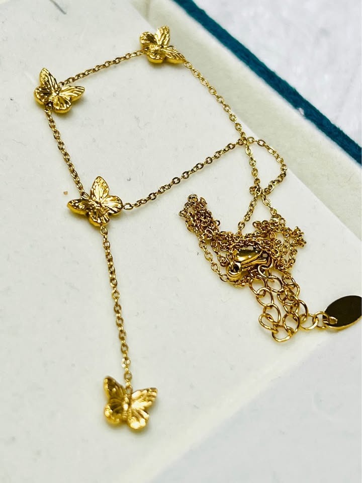 18k gold vermeil Papillon D'Or butterfly necklace showing the adjustable chain and clasp.