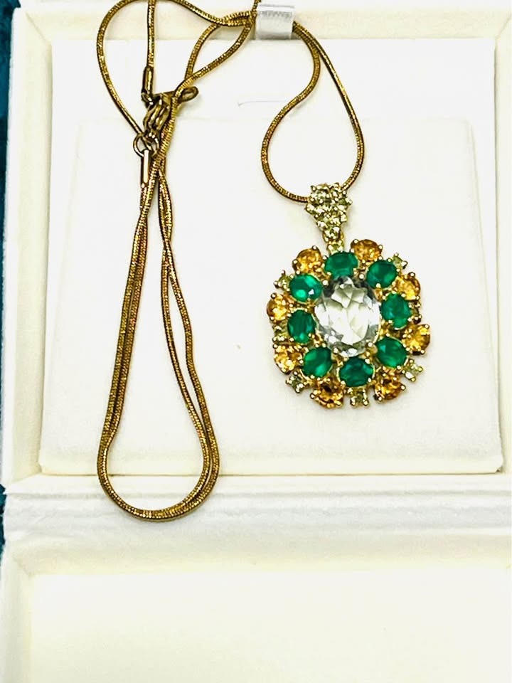  Beautiful green amethyst, green agate, and sapphire pendant necklace in an elegant jewelry box.