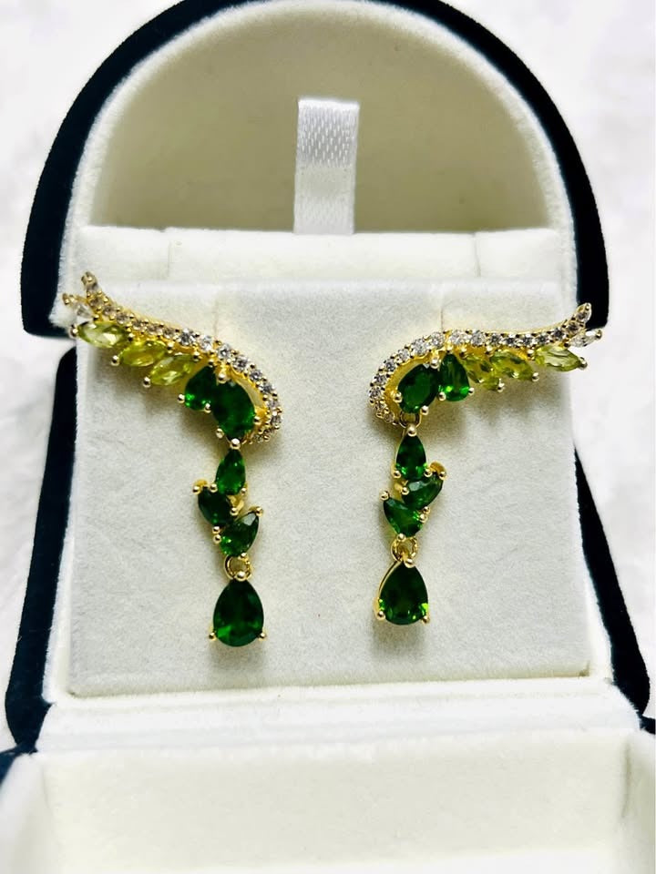 Striking green gemstone angel wing earrings featuring chrome diopside and peridot.