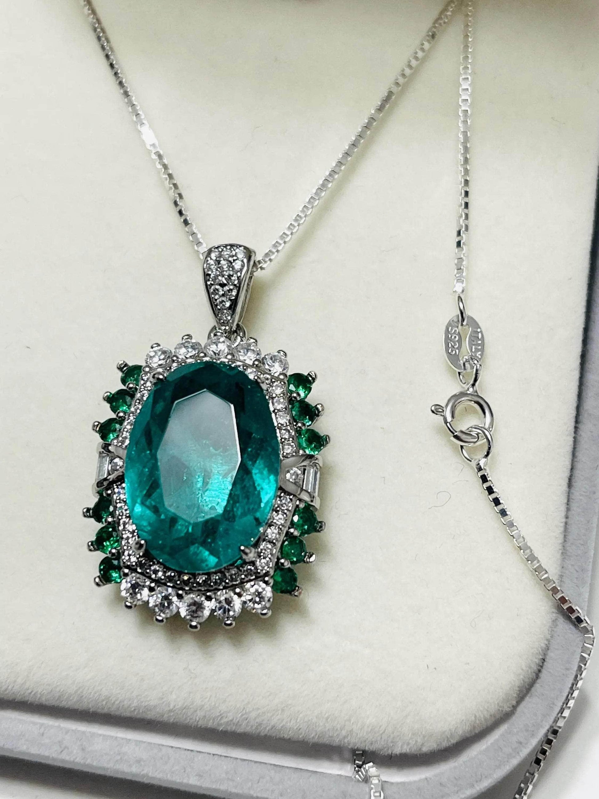 Lab-created emerald necklace in Italian sterling silver, showing both the pendant and the clasp detail.