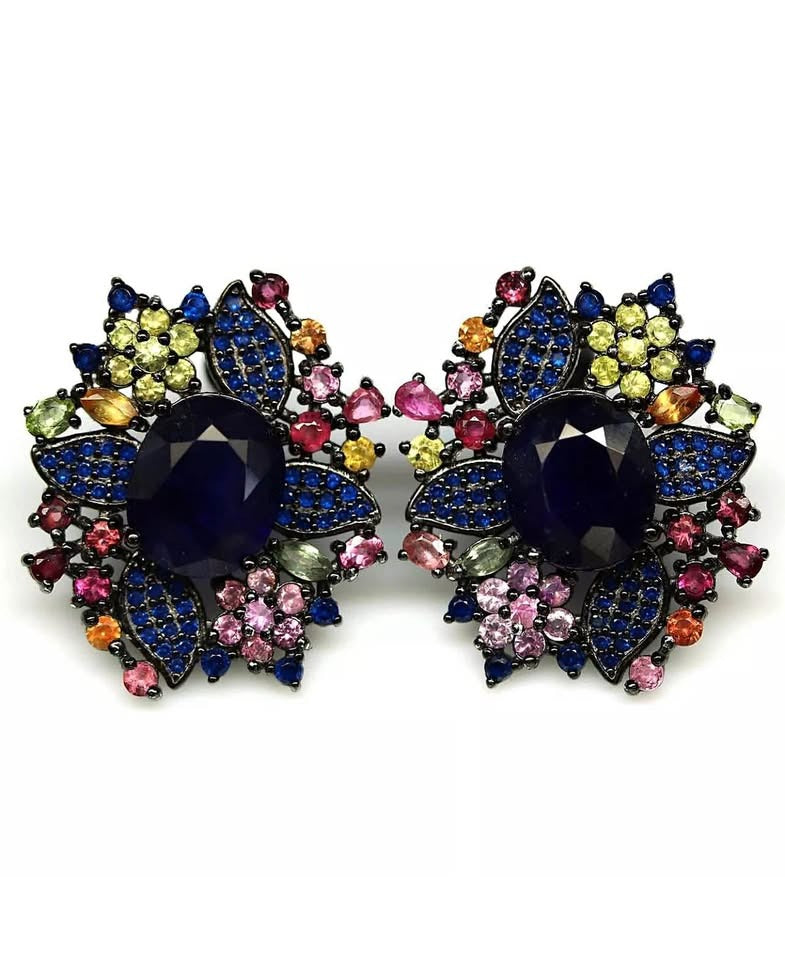 A pair of exquisite natural blue and multi-colored sapphire floral-design earrings on a white background.
