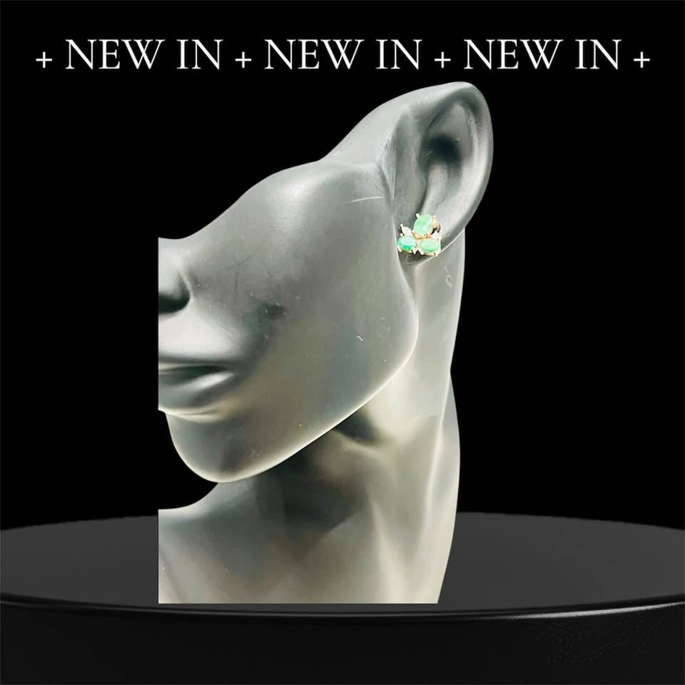 New arrival: Colombian emerald earrings on a display model, perfect for any occasion.