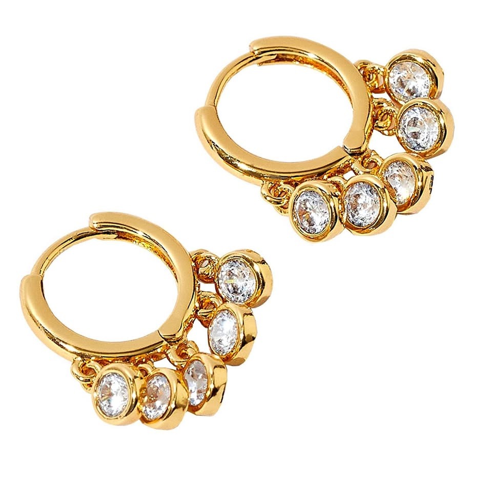 A pair of 18k gold vermeil fan hippie earrings with crystal accents, isolated on a white background.