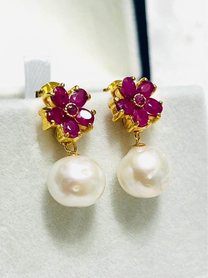 Exquisite pink ruby flower earrings with genuine South Sea pearl drops, perfect for elegant occasions.