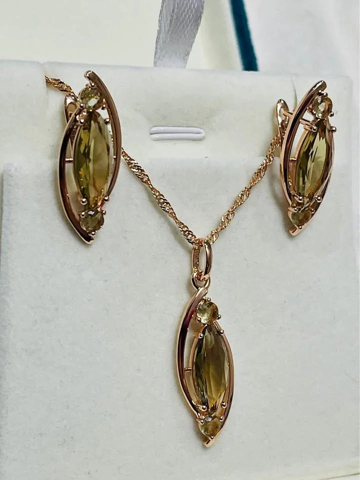 Beautiful 585RG rose gold citrine necklace and matching earrings set in a white jewelry box.