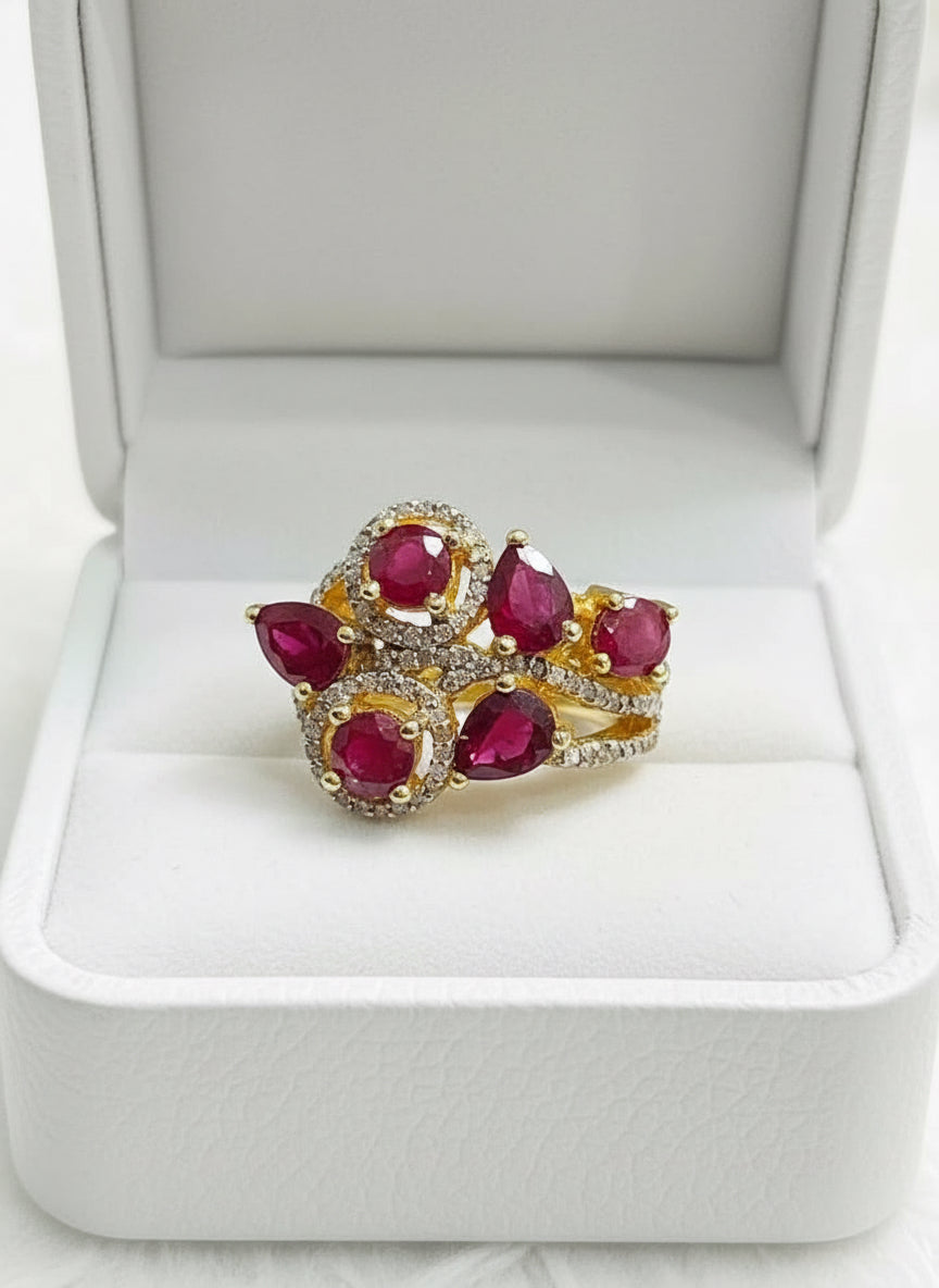 Angled view of a certified vintage-inspired ruby and diamond ring in sterling silver, sparkling in its box.