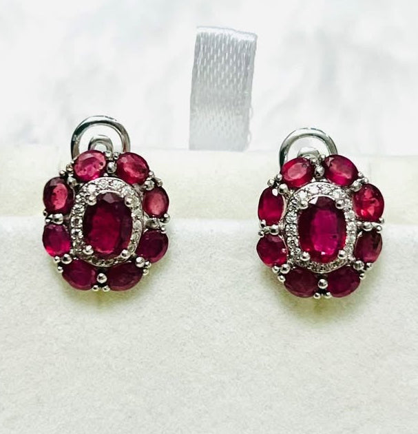 Exquisite ruby gemstone earrings in white gold-plated sterling silver, front view, perfect gift.
