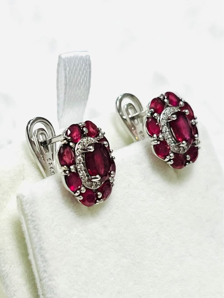 Timeless ruby earrings featuring a secure leverback closure, white gold-plated sterling silver.