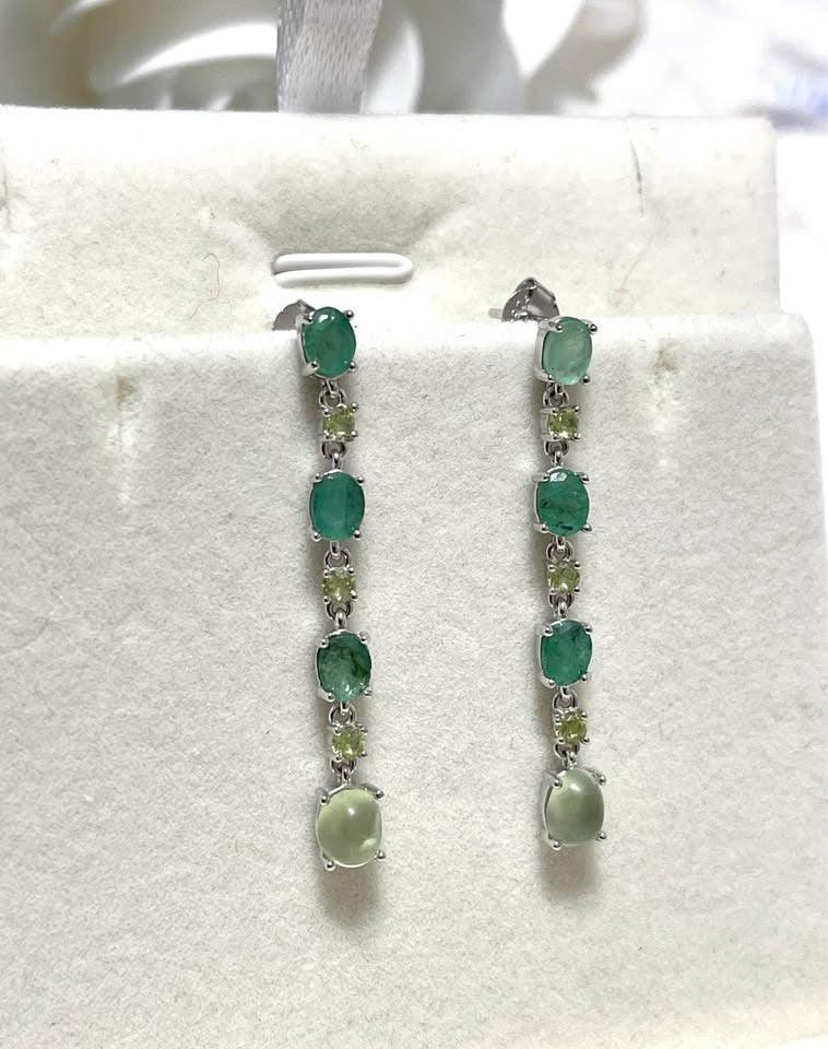  Front view of natural sterling silver dangle earrings with emerald, peridot, and prehnite stones.