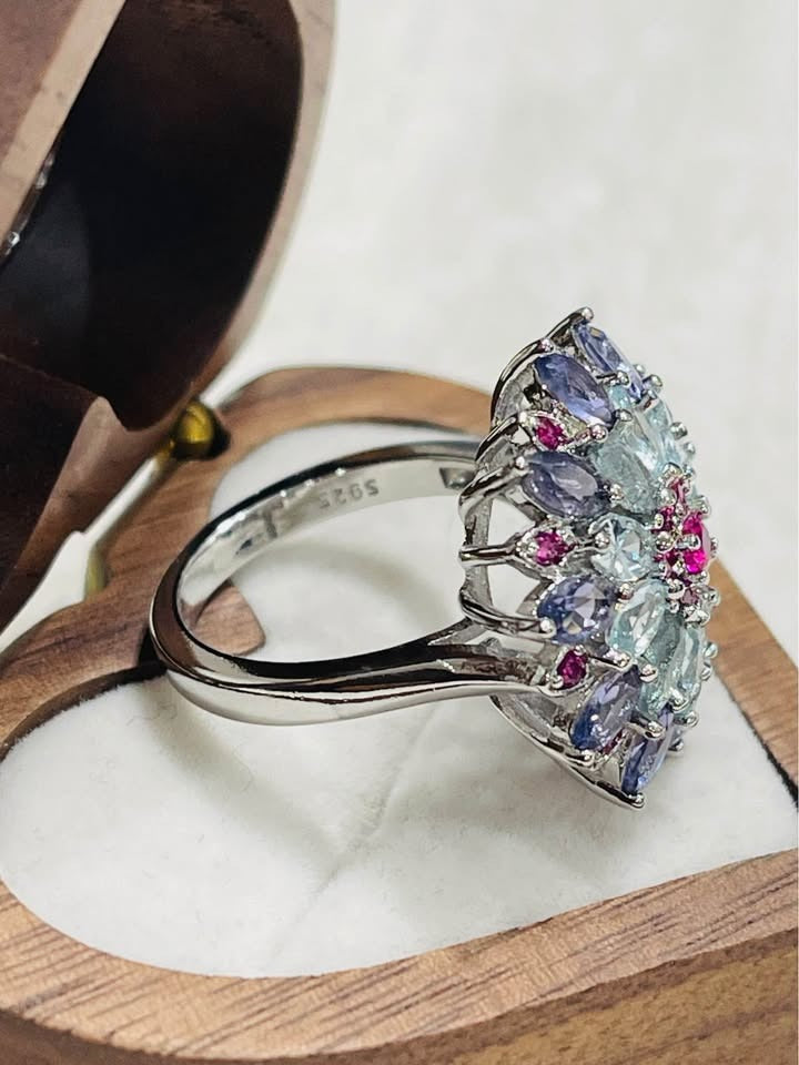 Side view of a stunning sterling silver ring, showing the S925 hallmark stamp on the band.
