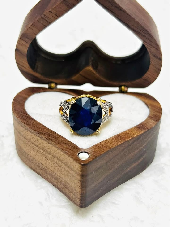 Exquisite sterling silver ring with 6 CTW sapphire and natural diamonds, in a heart-shaped wooden box.