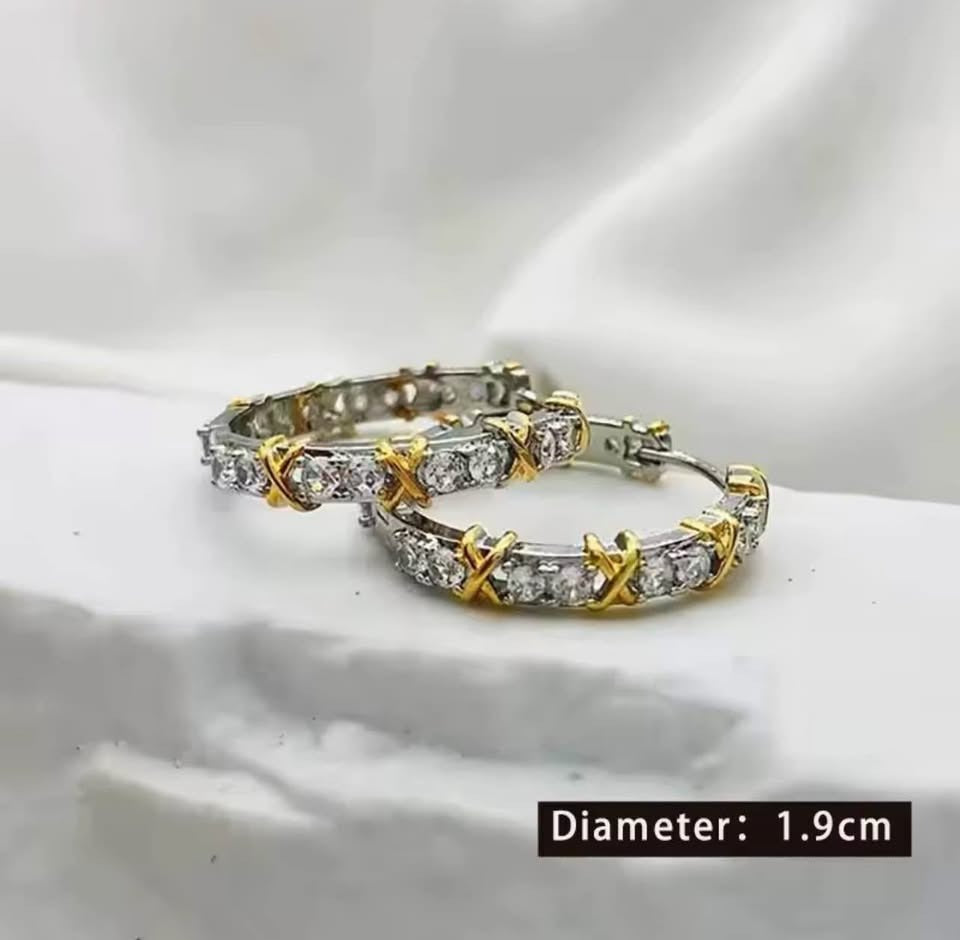 Gold plated silver XOXO hoop earrings with white stones, showing 1.9cm diameter.