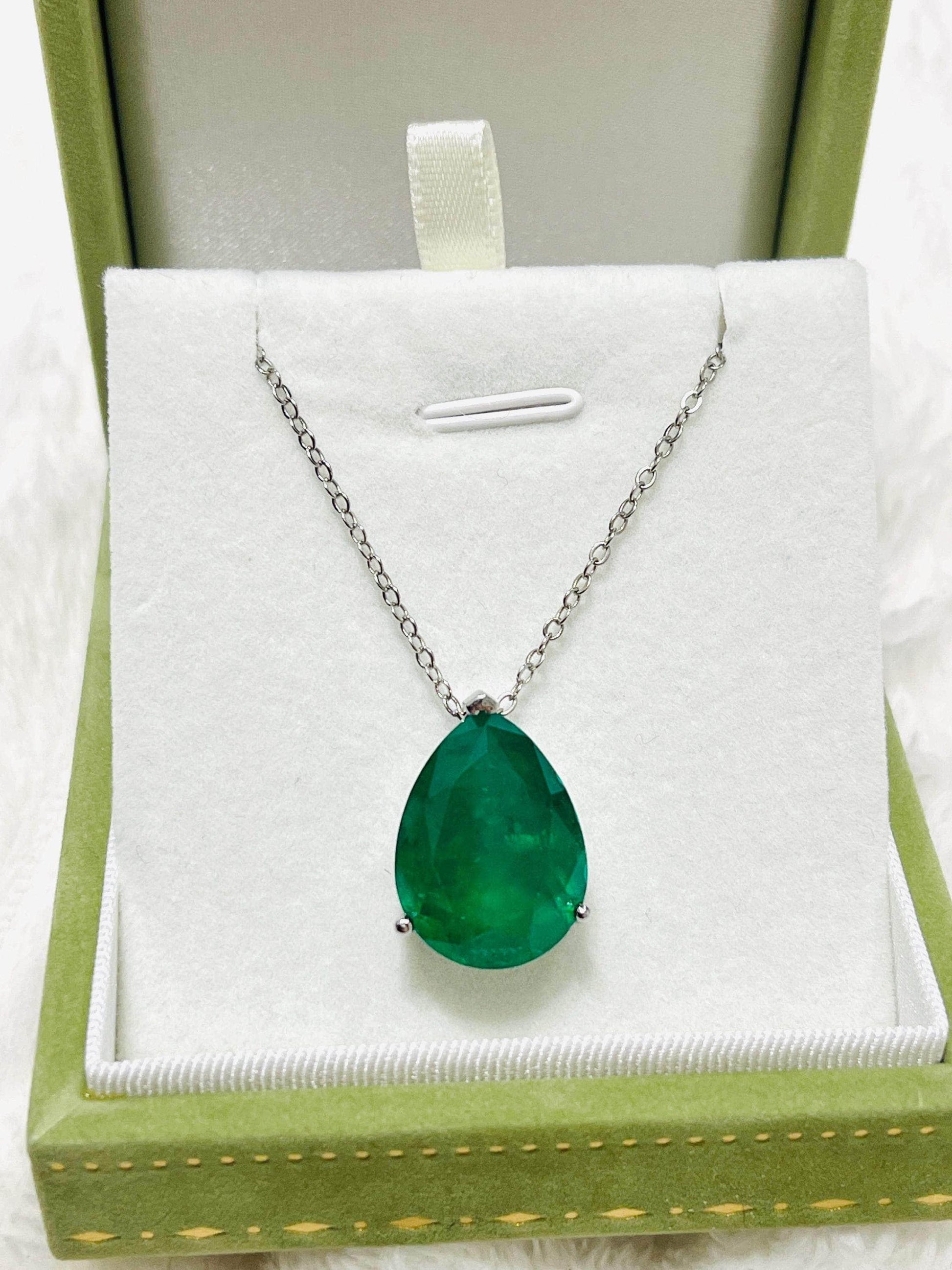 Stunning large Zambian emerald doublet pendant necklace, ready for gifting in its green velvet box.