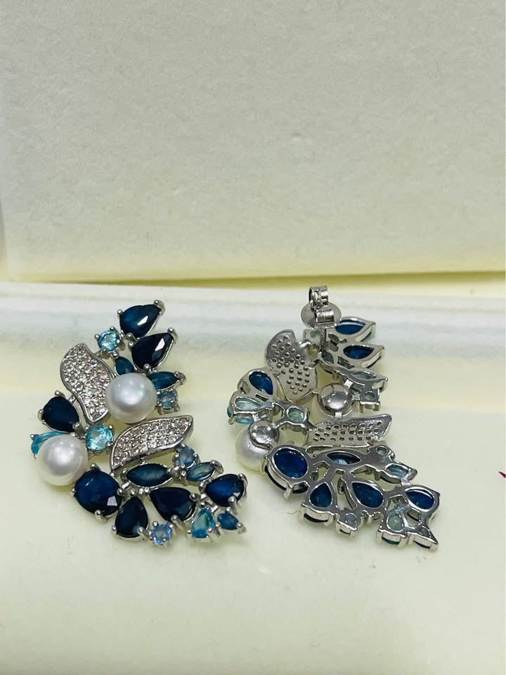Back view of the stunning sterling silver earrings with sapphire, topaz, and pearls, showing the post.