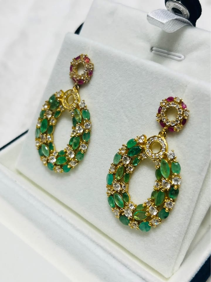 Dazzling vintage natural emerald and ruby earrings adorned with cubic zirconias.
