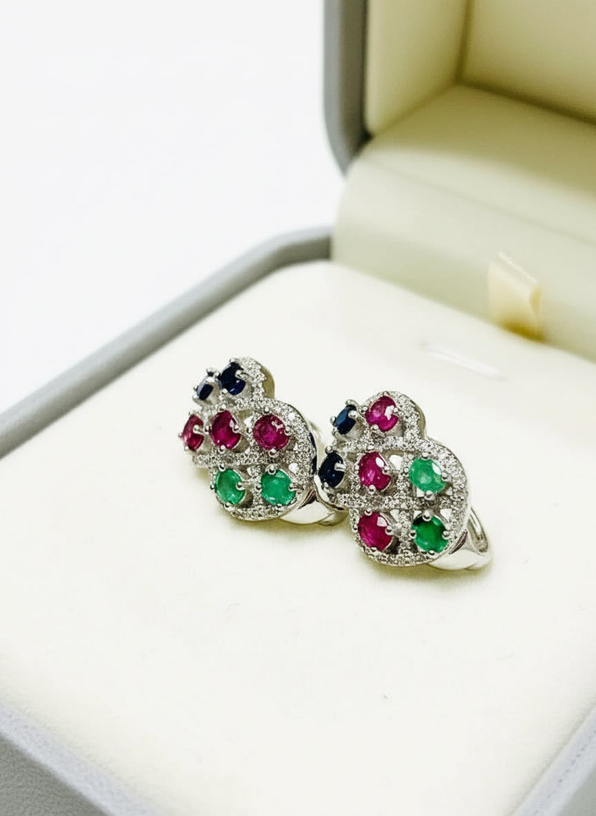  Angled view of Edwardian-inspired 18K white gold vermeil earrings featuring vibrant gemstones.