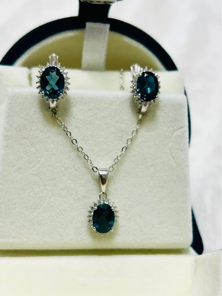 Elegant natural London blue topaz pendant and earrings set, perfect for any occasion.