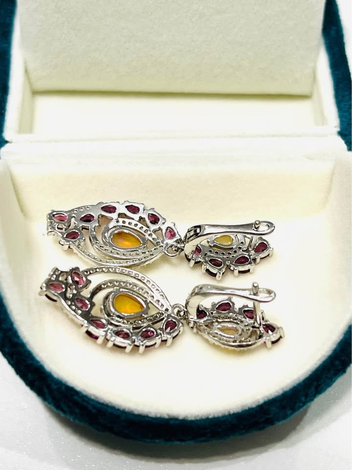 Back view of handcrafted fire opal and rhodolite garnet vintage-inspired earrings.