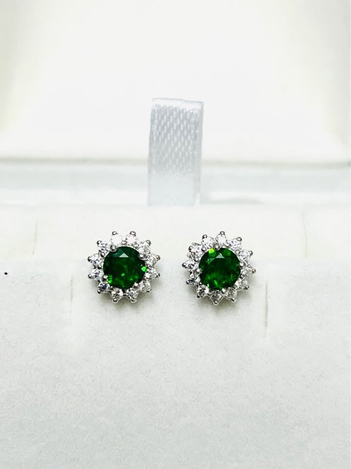 Genuine natural chrome diopside halo stud earrings displayed in a pristine jewelry box.