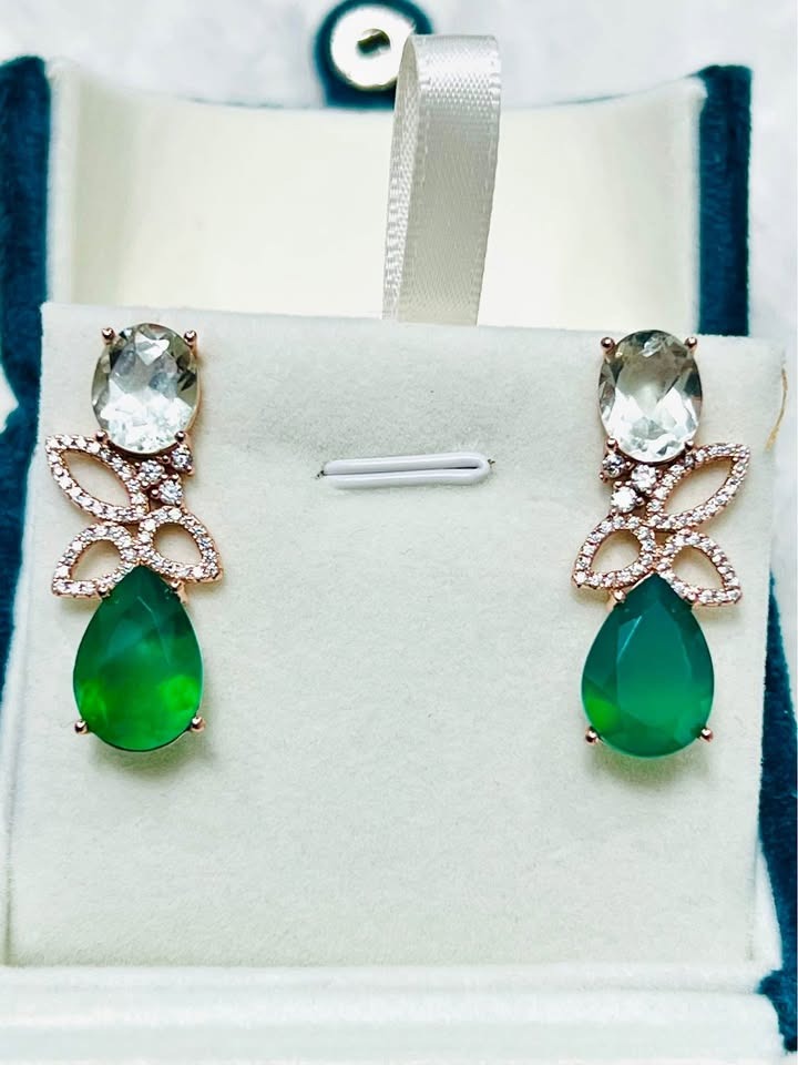 Beautiful dangle earrings with oval green amethyst, a cubic zirconia butterfly, and a large green agate drop.