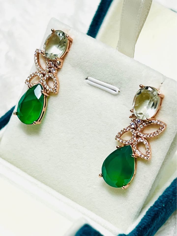 Rose gold dangle earrings with a green amethyst stud, CZ-adorned butterfly detail, and green agate drop.
