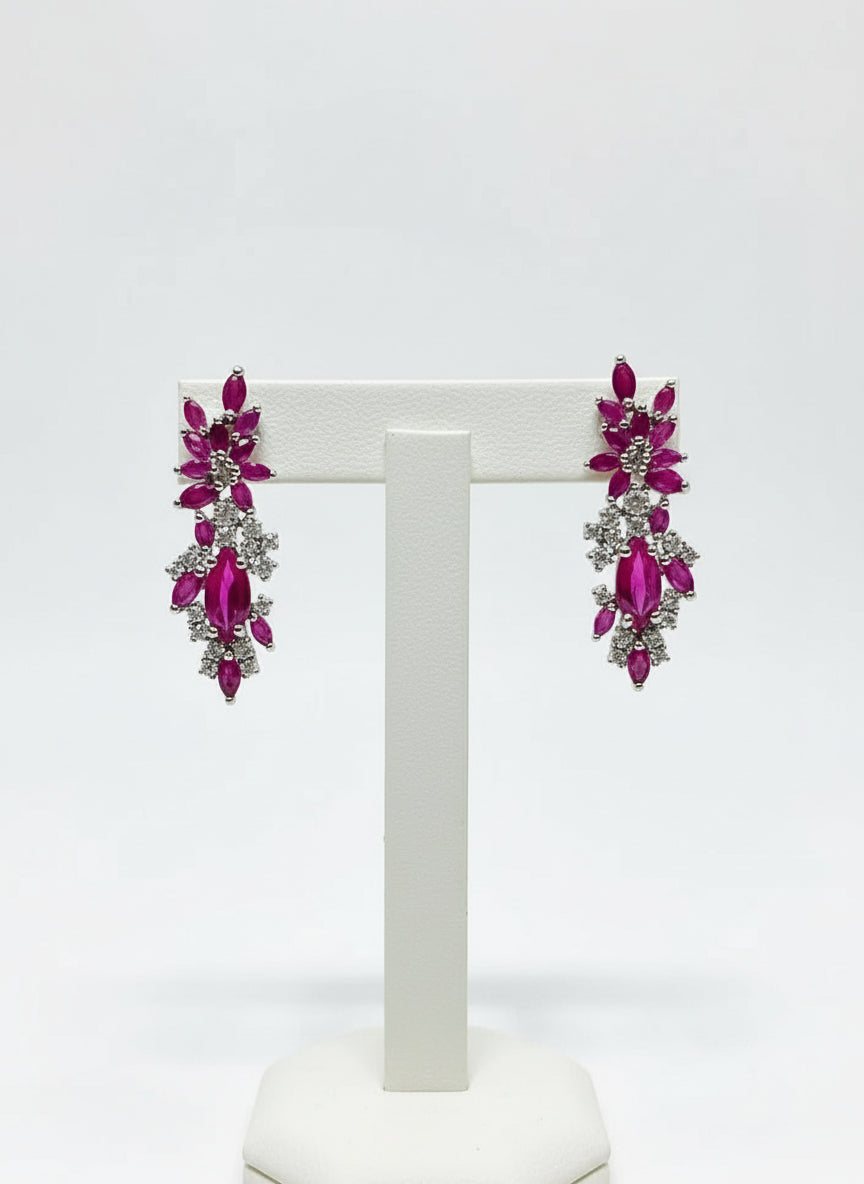 Marquise & round cut pink ruby earrings in sterling silver. A beautiful, high-quality gemstone accessory.